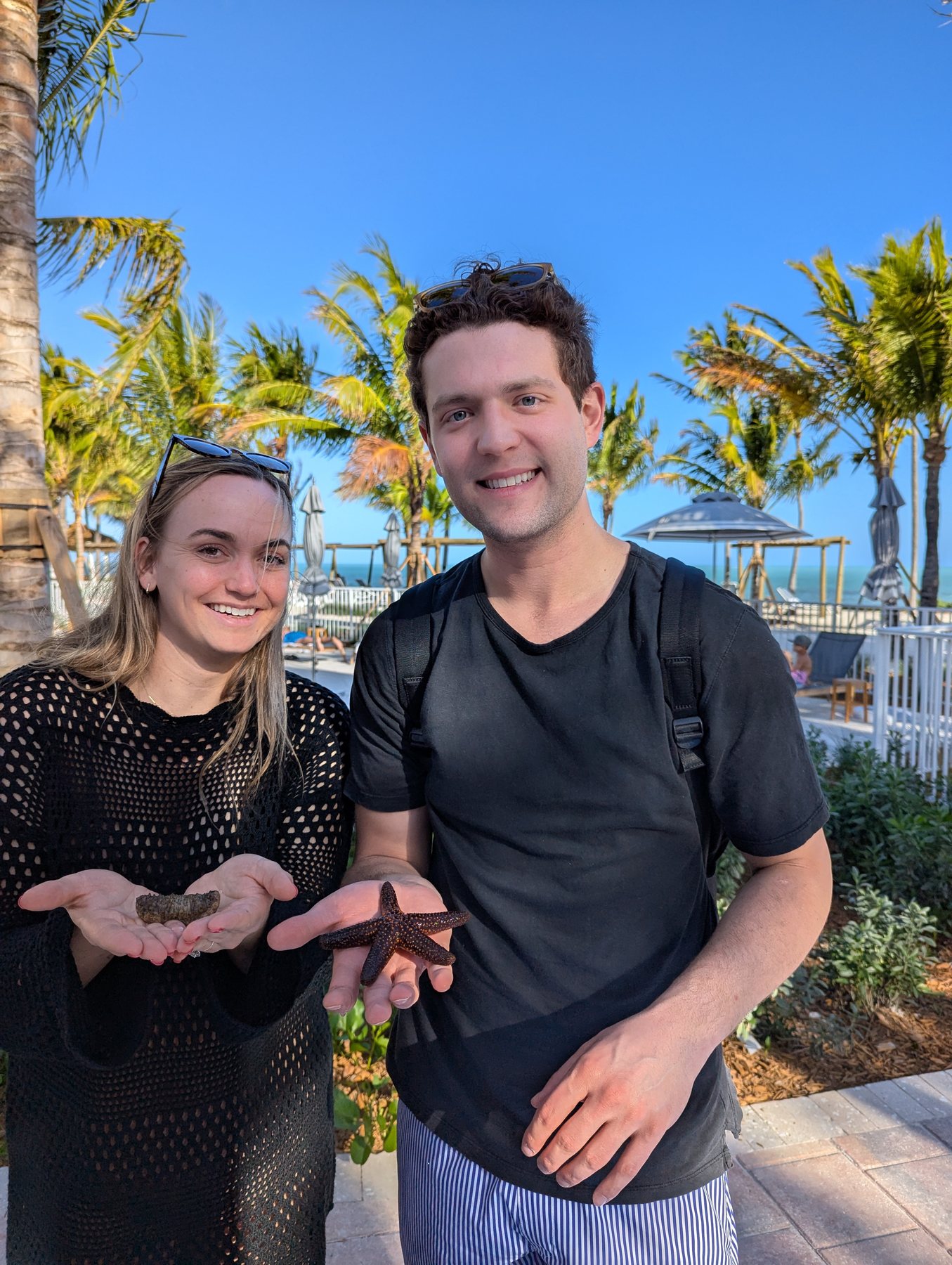 Guest holding marine animals during an interactive program